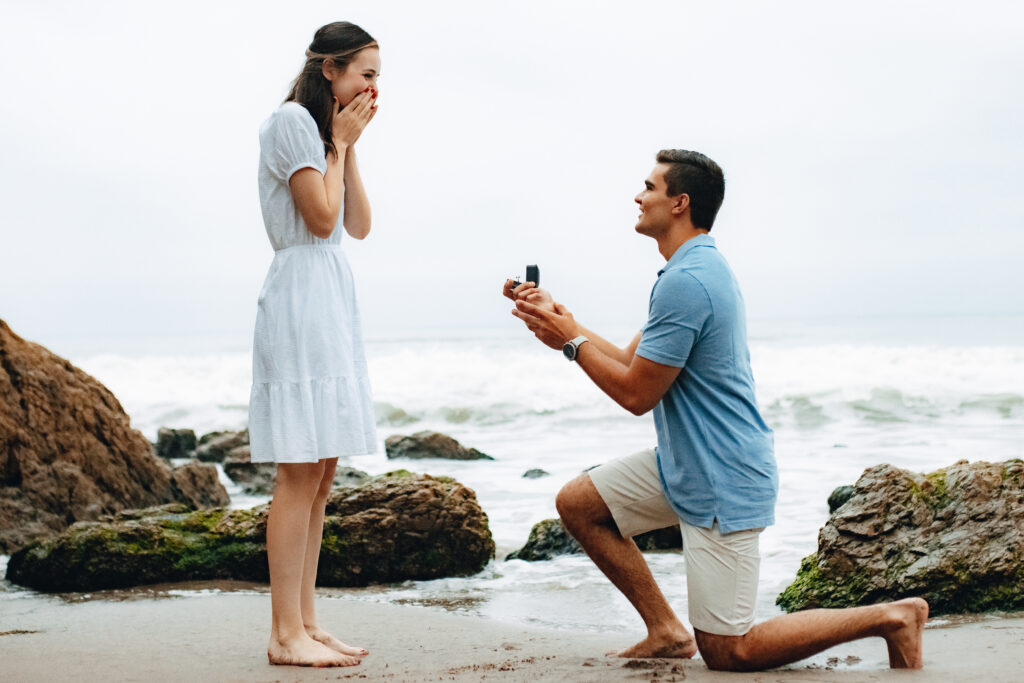 Man proposing to a woman looking surprised